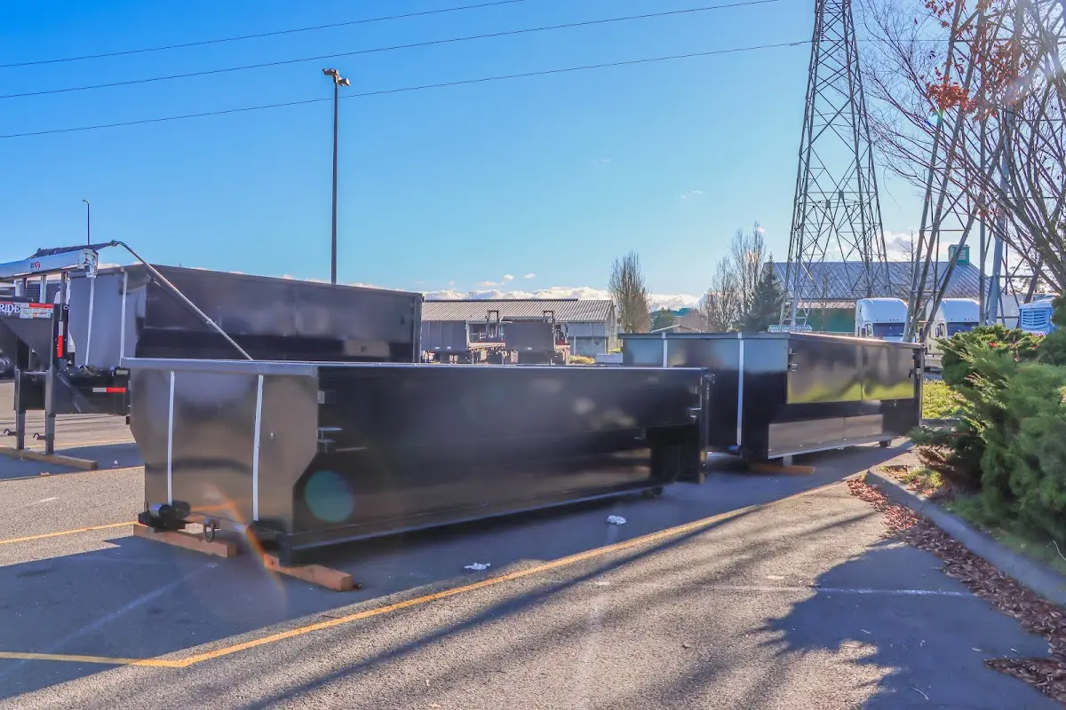 Roll-off dumpster ready for waste disposal at job site for 15 Yard Dumpster Rental in Four Corners